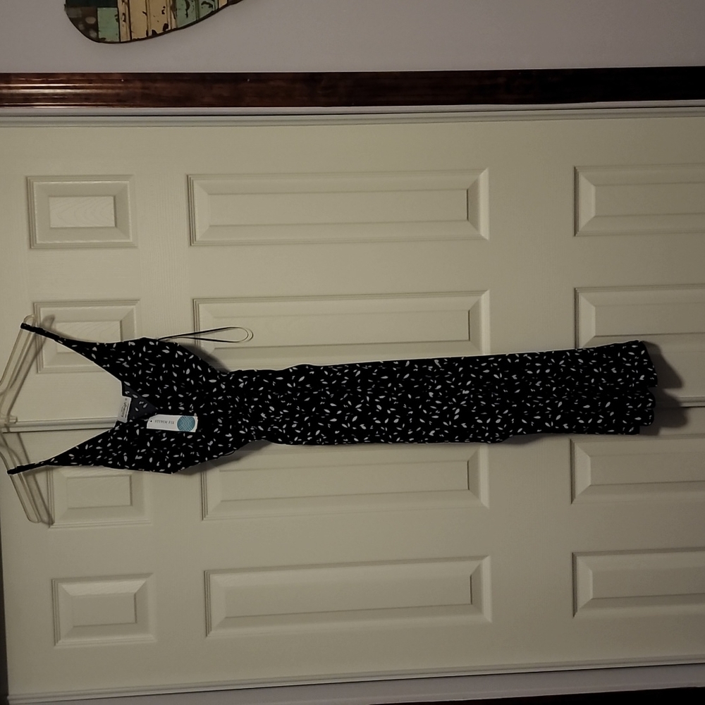 Navy print wide leg jumpsuit with belt tie size M by Kaileigh
